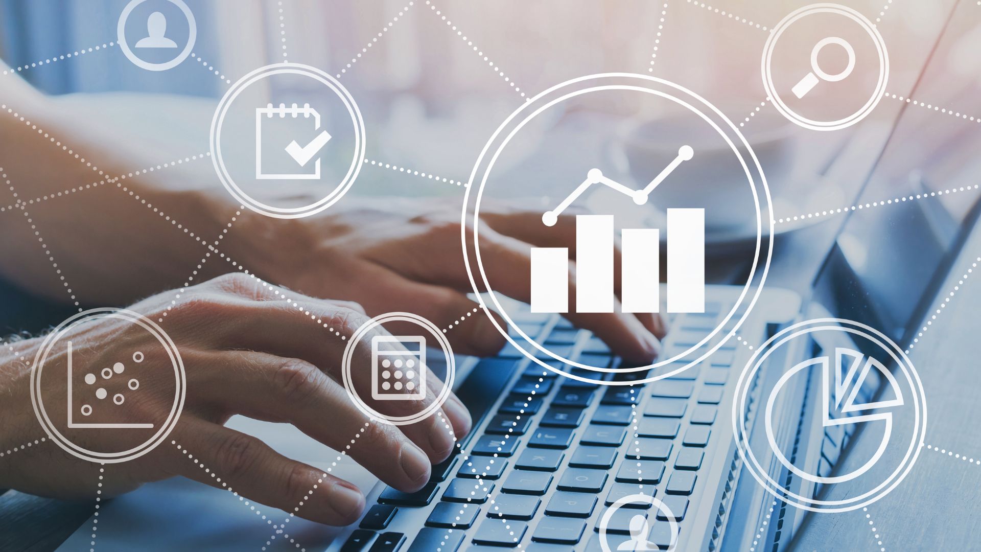 Hands typing on a laptop keyboard with transparent financial and data analytics icons overlaid, including charts, graphs, and a calculator.